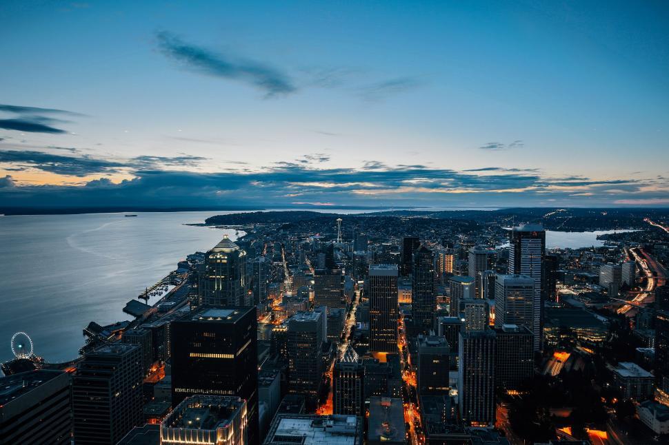 Free Image of A View of a City at Night From the Top of a Building 