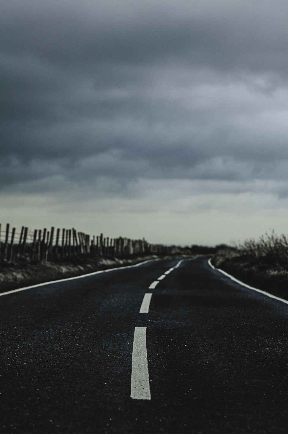 Free Image of Empty Road Stretching Through Countryside 