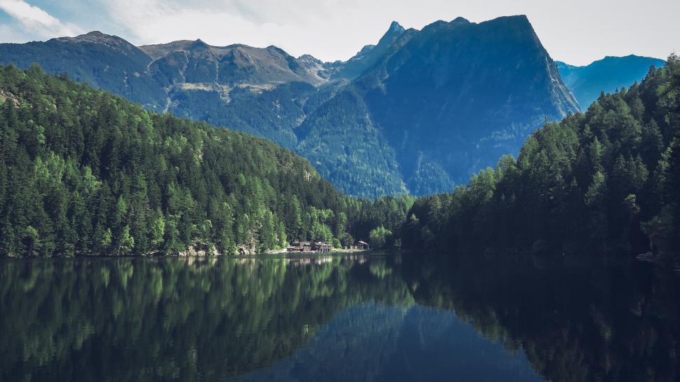 Free Image of Majestic Lake Surrounded by Towering Mountains 
