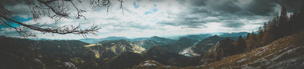 Free Image of Majestic Mountain Range Under Cloudy Sky 
