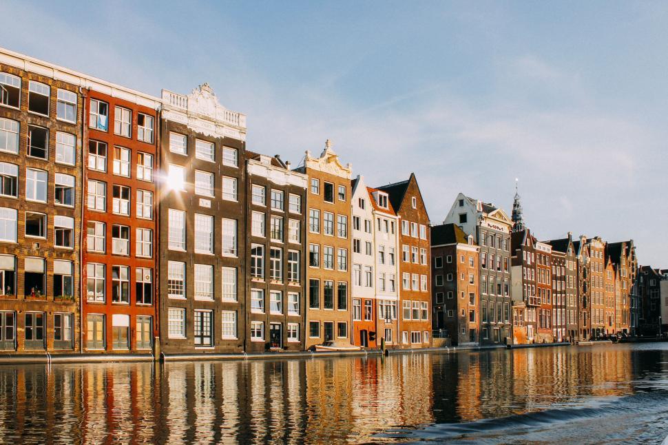 Free Image of Waterfront Buildings Along a River 