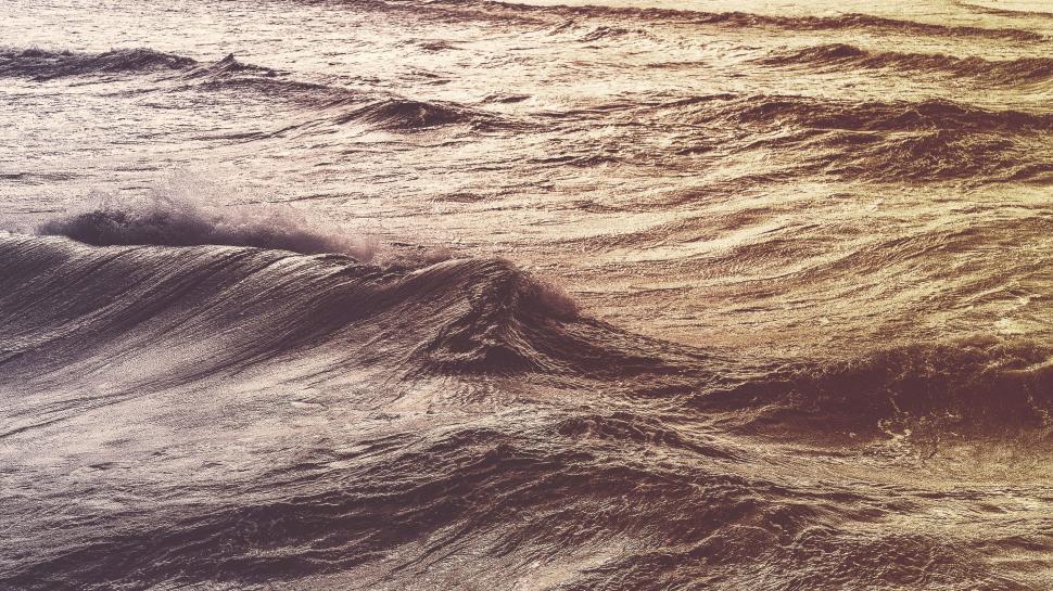 Free Image of Man Riding Surfboard on Top of Ocean Wave 