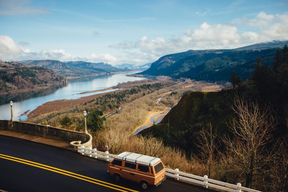 Free Image of Van Driving Along Mountain Road 