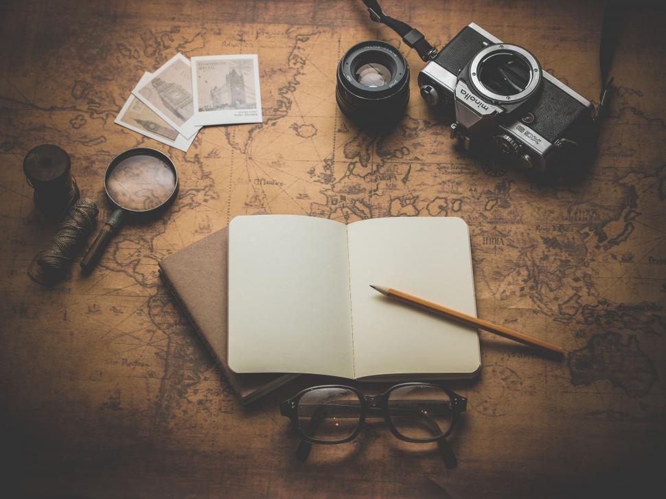 Free Image of Open Book and Glasses on Table 