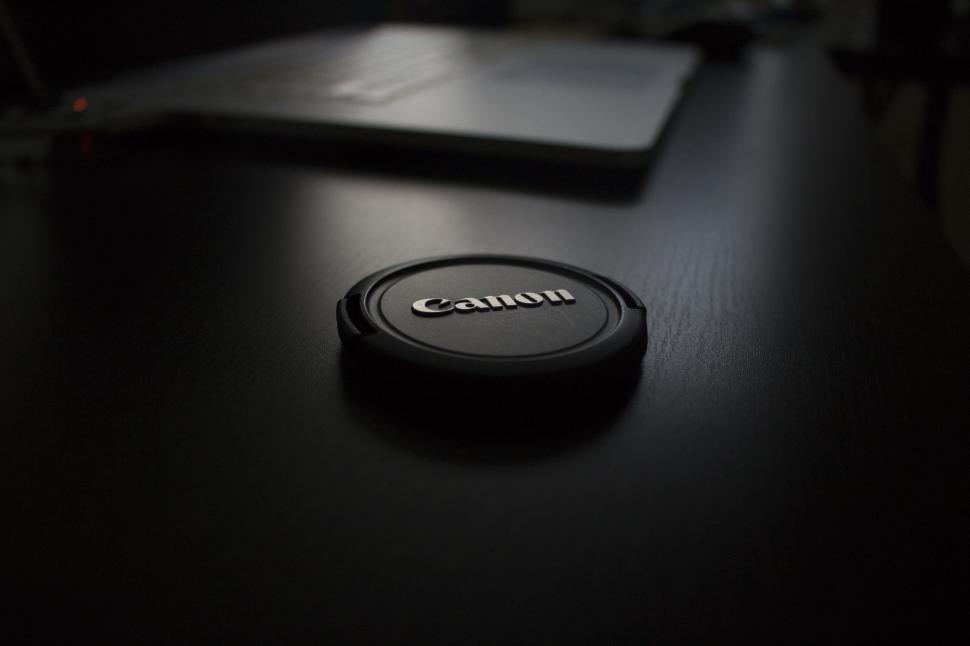 Free Image of Camera on Wooden Table 
