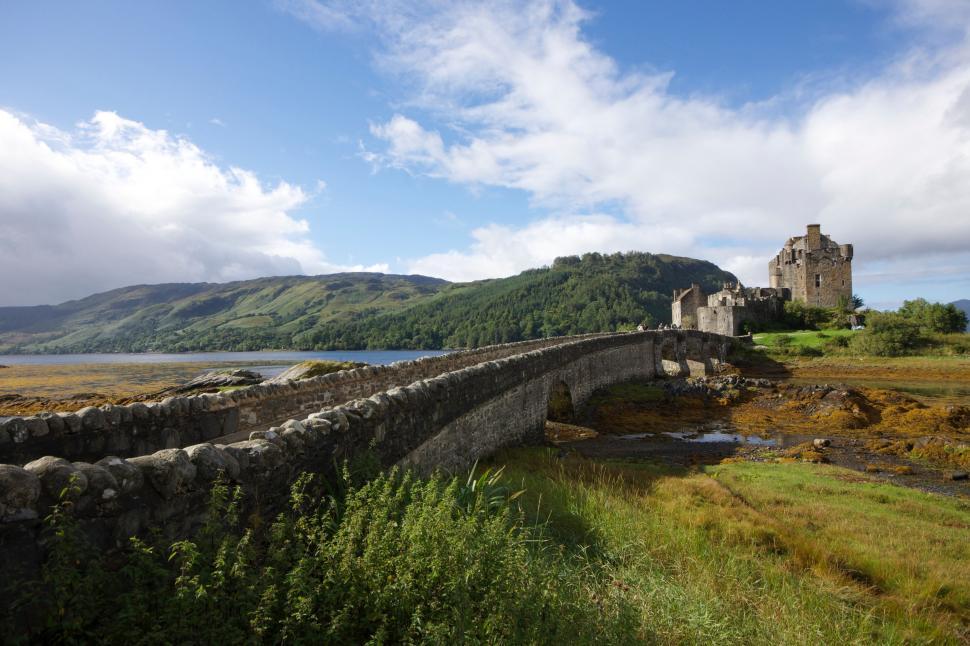 Free Image of Stone Bridge Crossing Over a River 