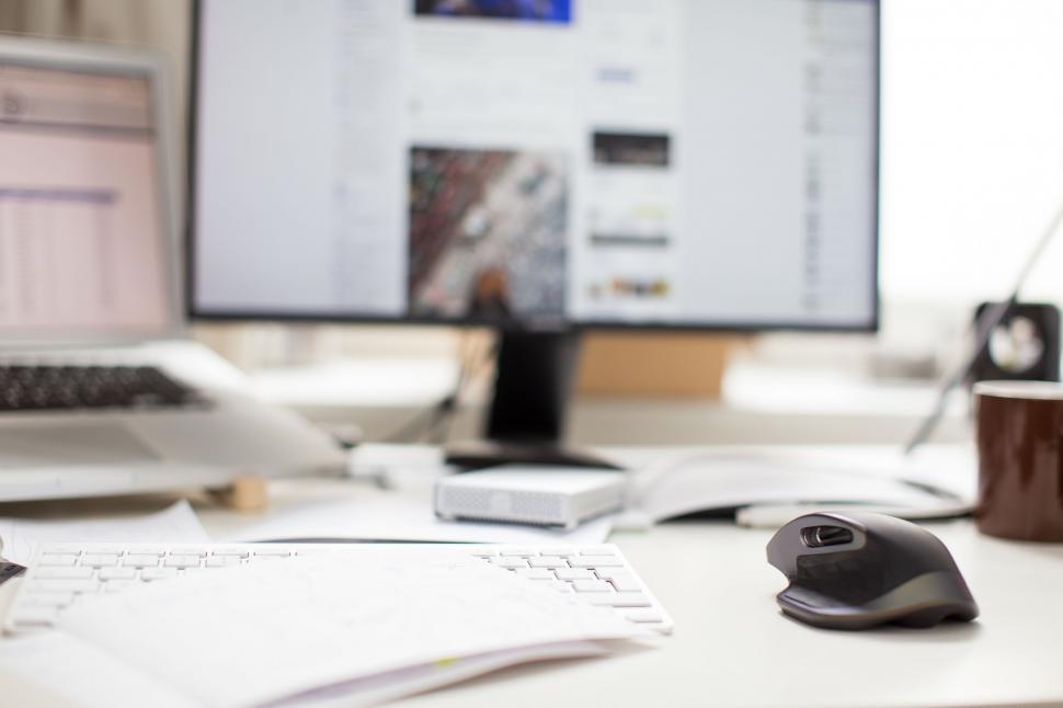 Free Image of Modern Desk Setup With Computer Monitor, Keyboard, and Mouse 