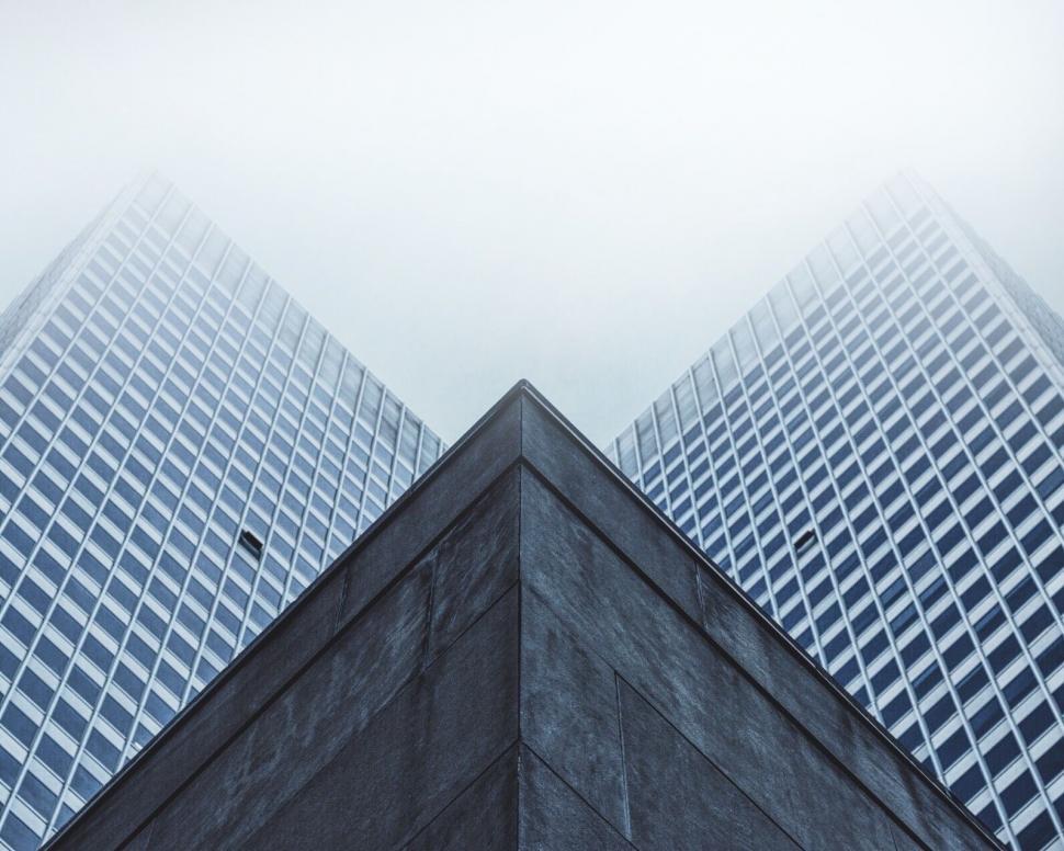 Free Image of Two Tall Buildings Standing Side by Side 