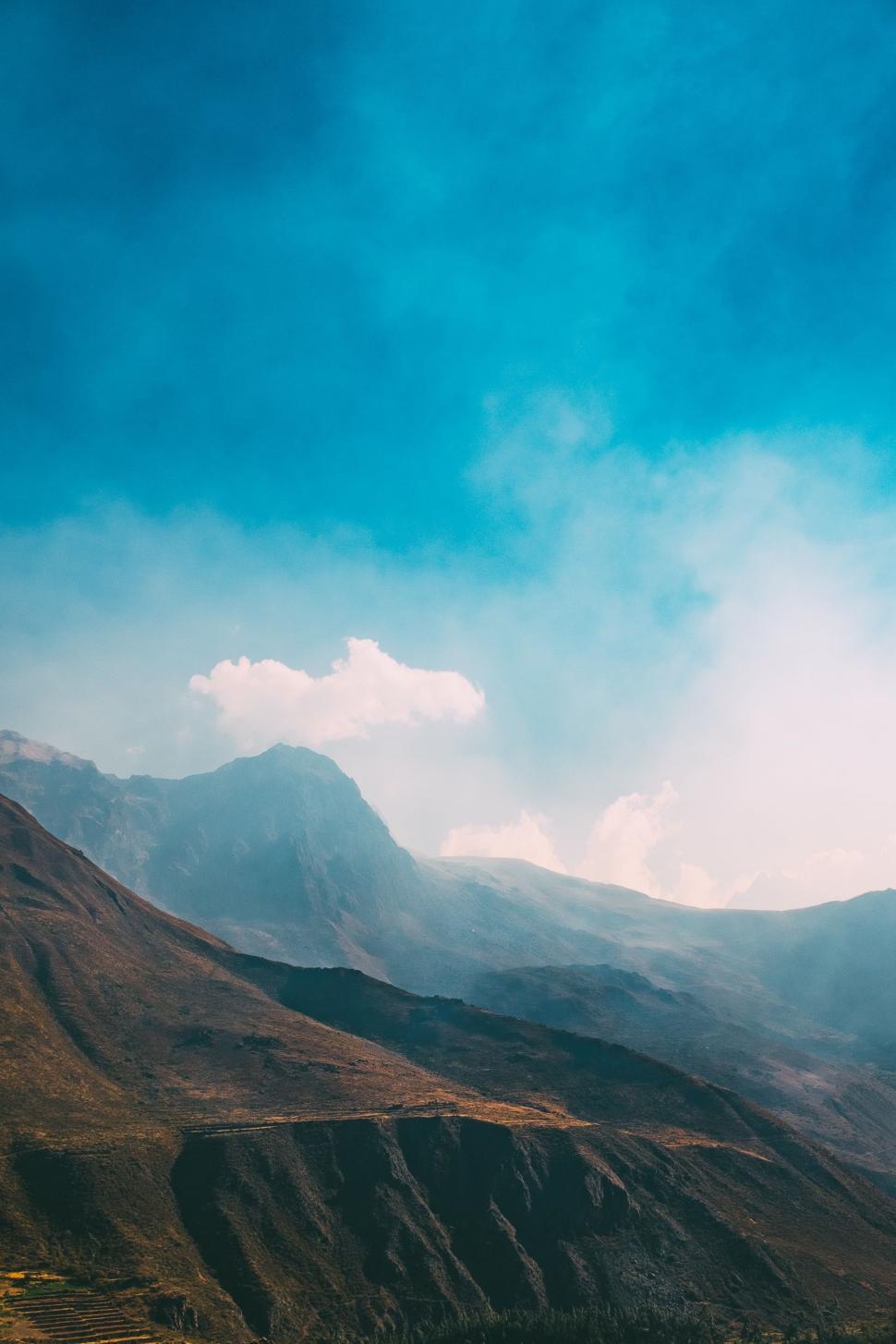 Free Image of Majestic Mountain Range With Clouds 