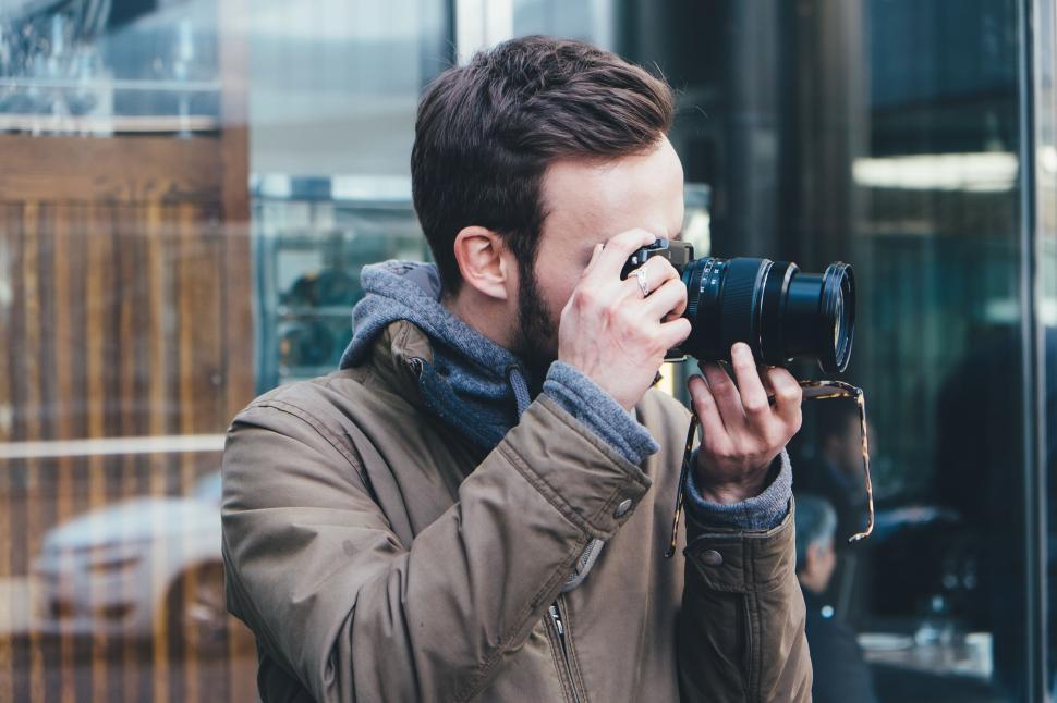 Free Image of Man Taking a Selfie With Camera 