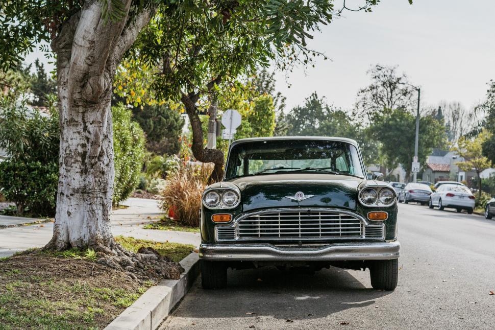 Free Image of Old Car Parked on Side of Road 