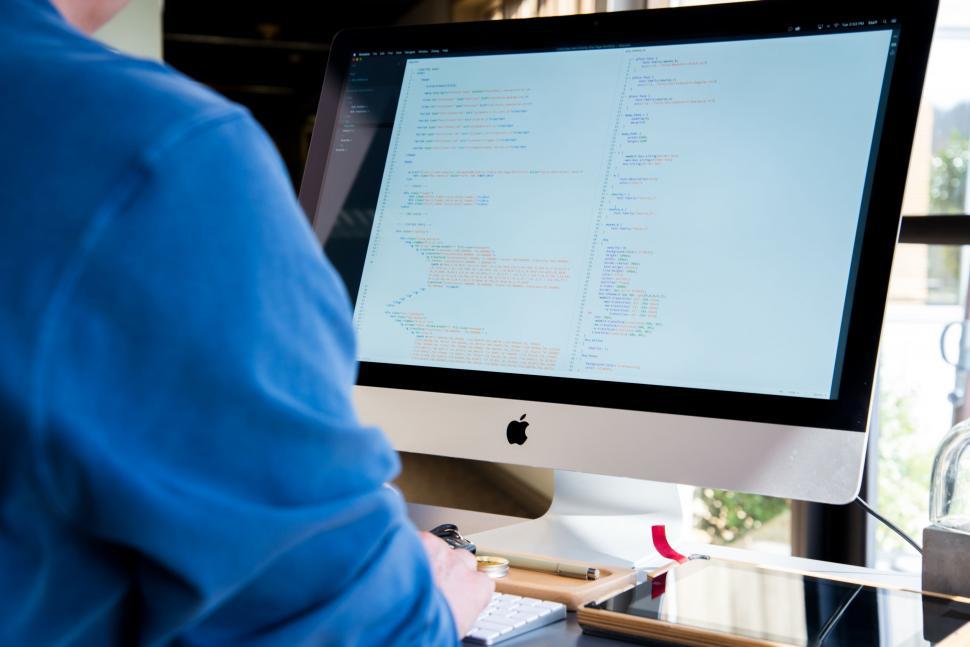 Free Image of Man Working at Computer Monitor 
