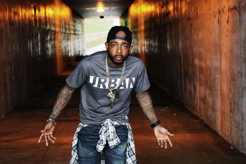 Free Image of Man Standing in Tunnel With Outstretched Hands 