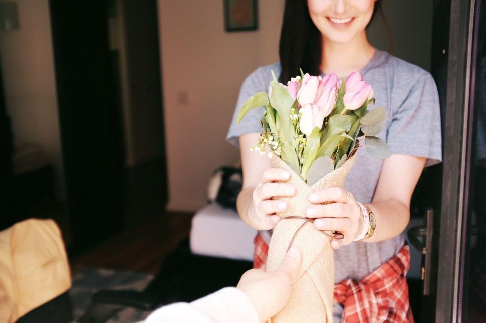 Free Image of Woman Holding Bouquet of Flowers 