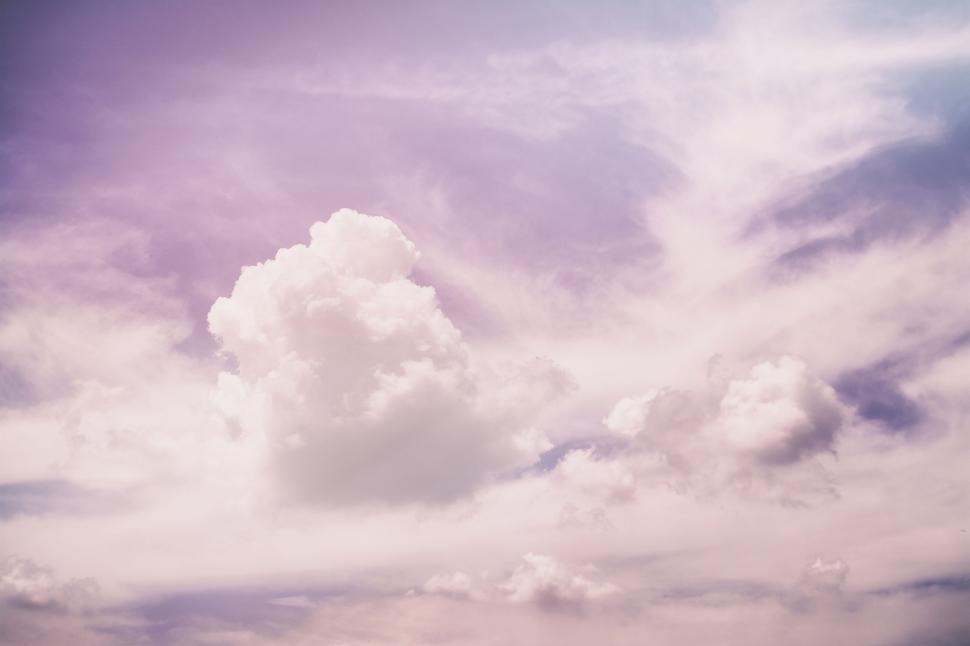 Free Image of Plane Flying in Cloudy Sky 