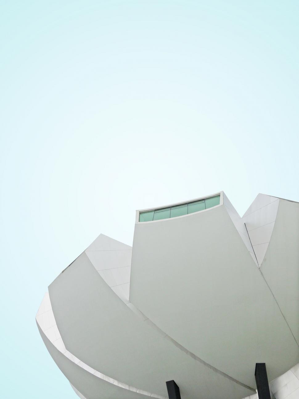 Free Image of Tall Building With Clock on Side 
