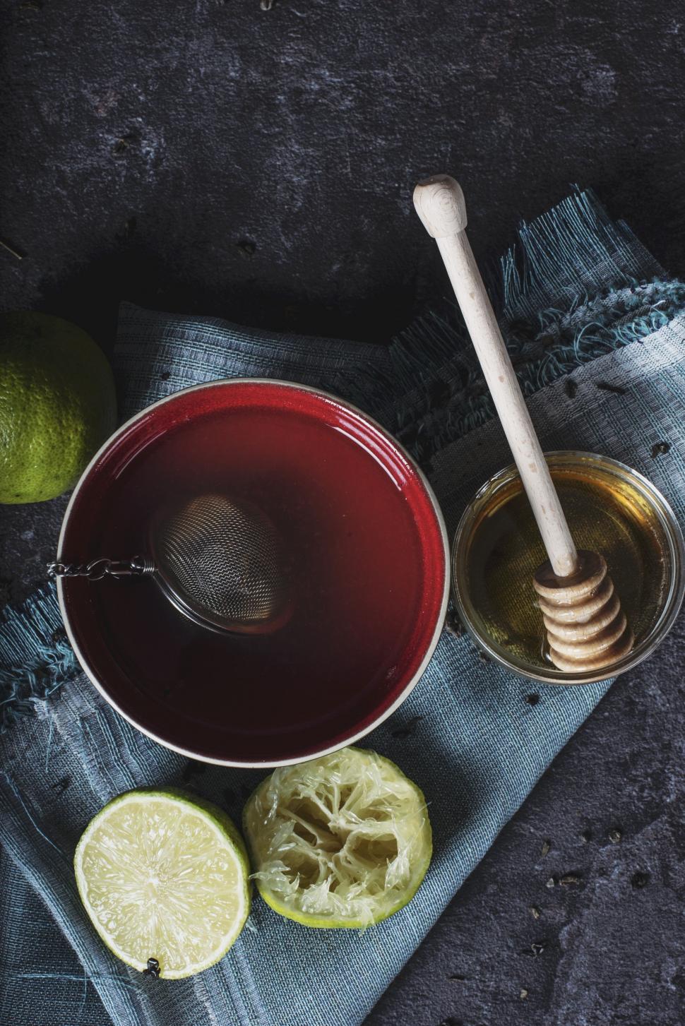 Free Image of Bowl of Limes and Spoon on Cloth 