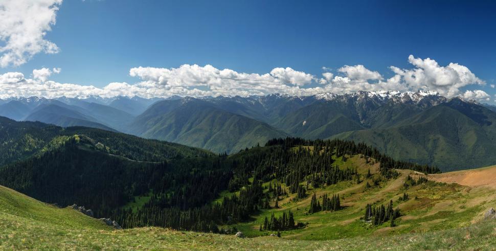 Free Image of Majestic Mountain Range Under Cloudy Sky 