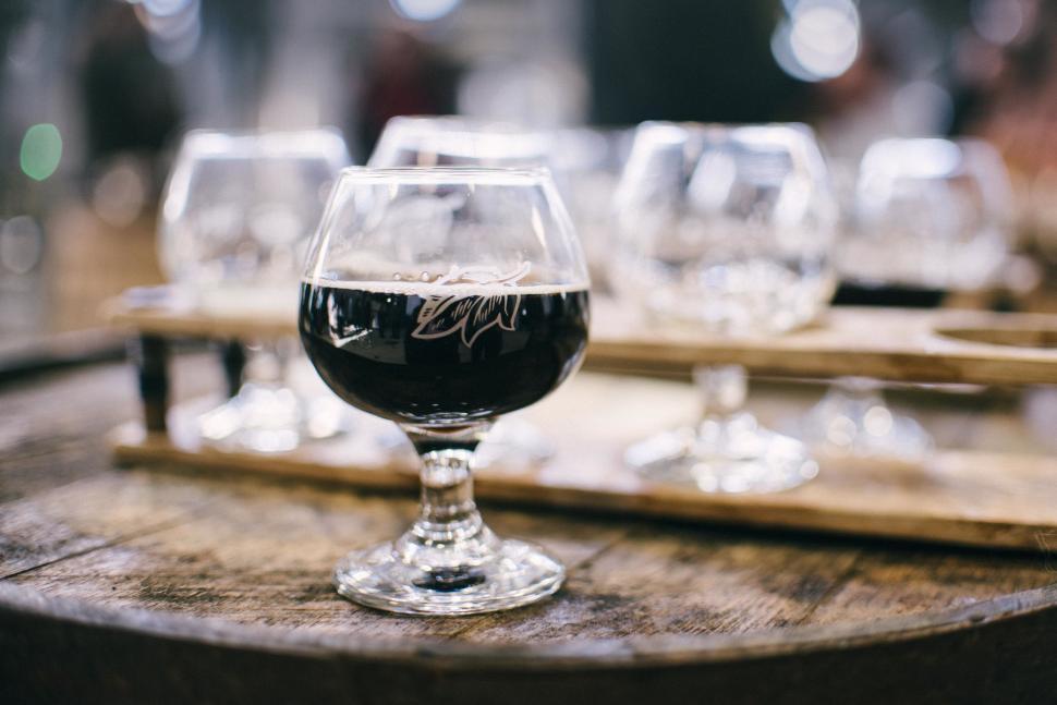 Free Image of Row of Wine Glasses on Wooden Table 