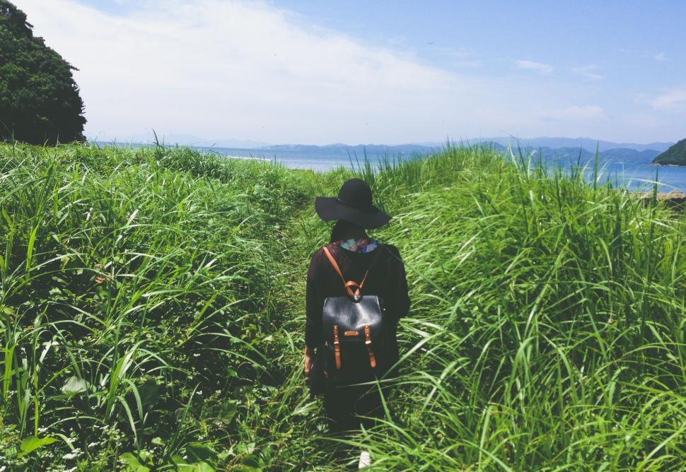Free Image of Person Standing in Tall Grass Field 