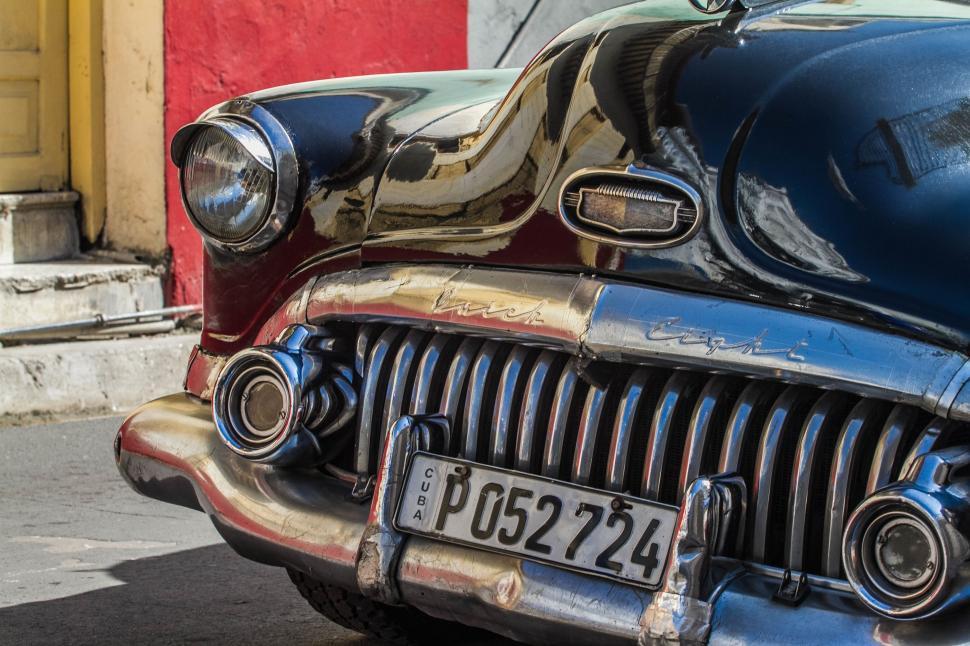 Free Image of Old Car Parked Along Roadside 