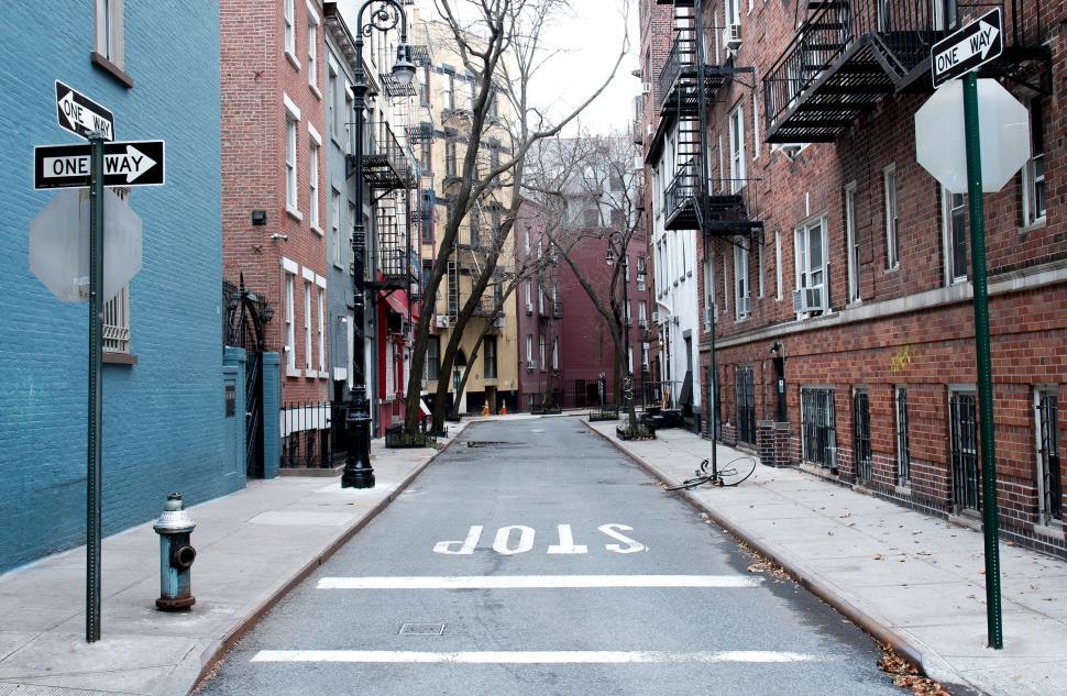 Free Image of City Street With Buildings and Fire Hydrant 