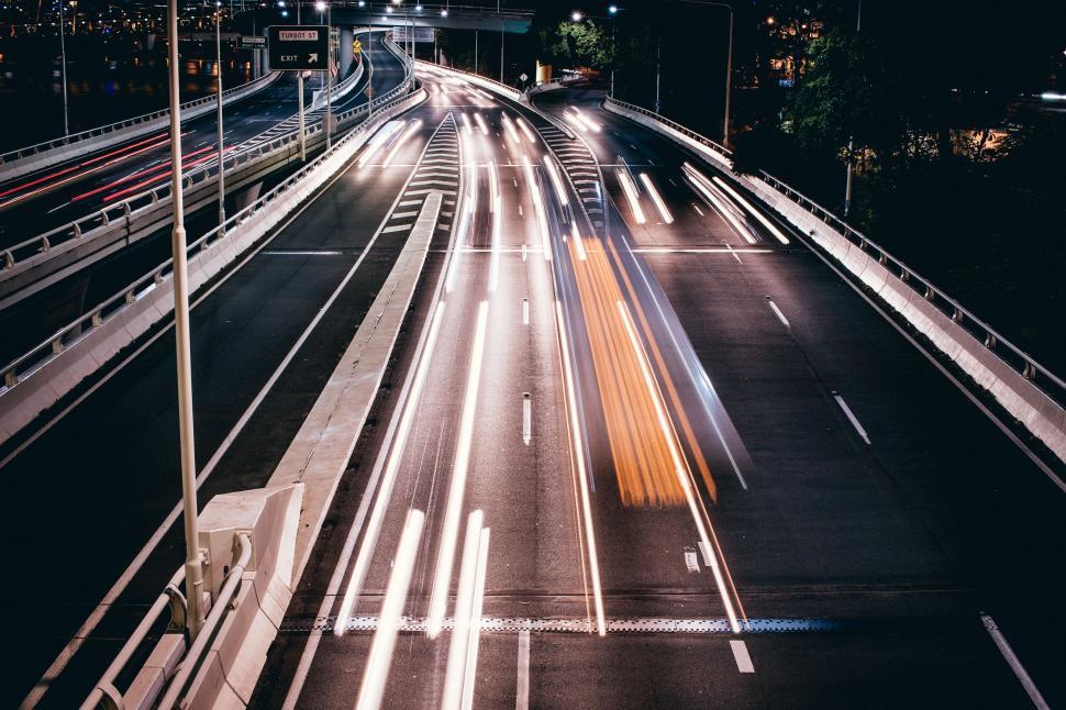 Free Image of Busy City Street Filled With Night Traffic 