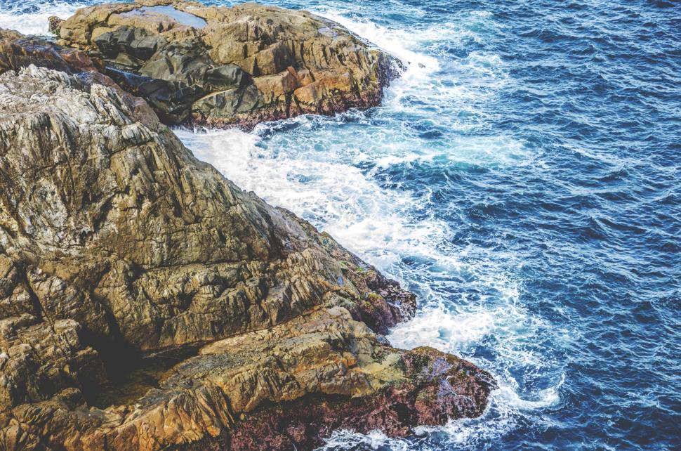 Free Image of Two Large Rocks Resting on Water Surface 
