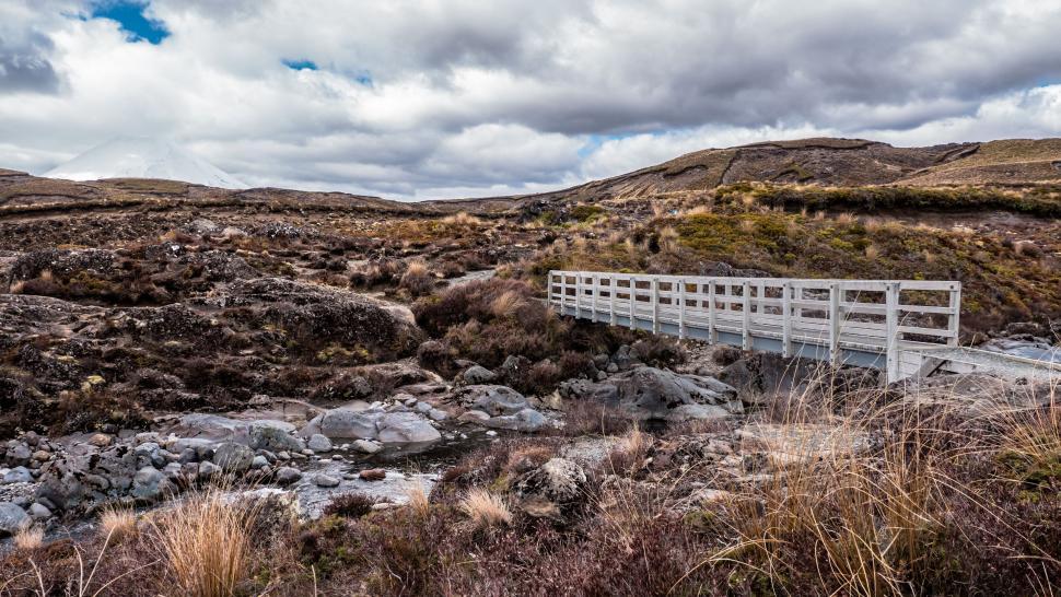 Free Image of White Fence Standing in Field 