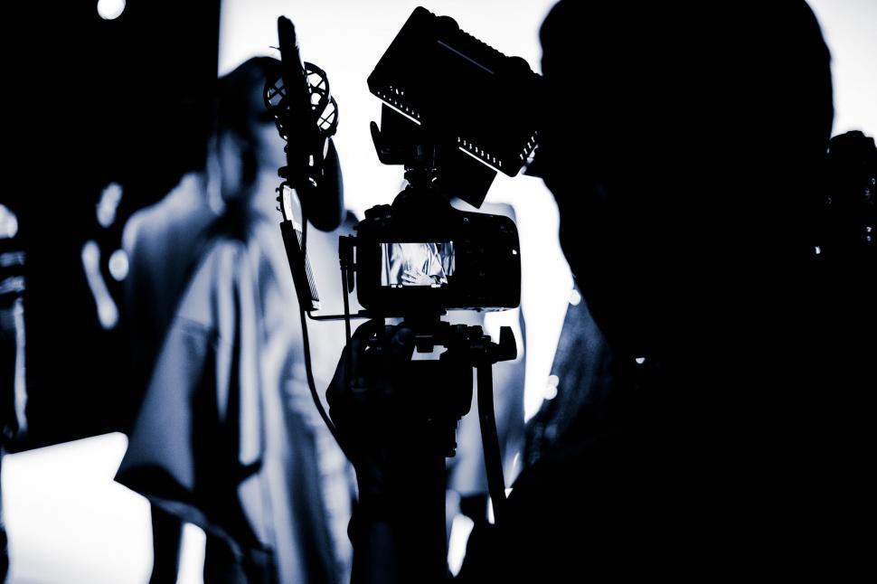 Free Image of Person With Camera Capturing a Moment 