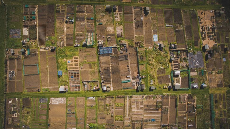 Free Image of Aerial View of Lush Grass Farm Land 