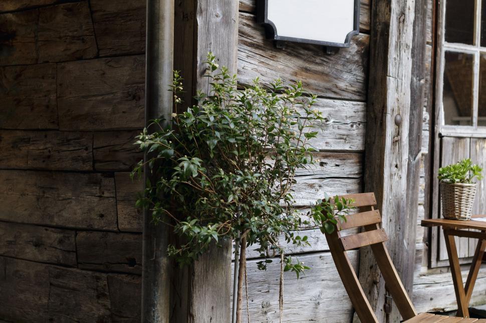 Free Image of Wooden Chair Next to Wooden Table 