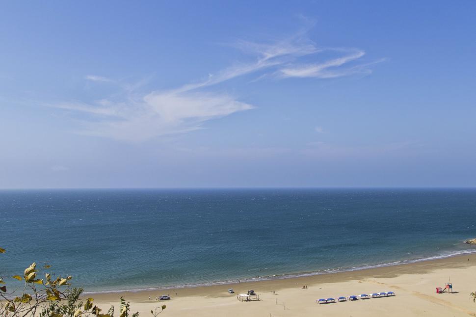 Free Image of Panoramic View of Beach and Ocean From Hilltop 