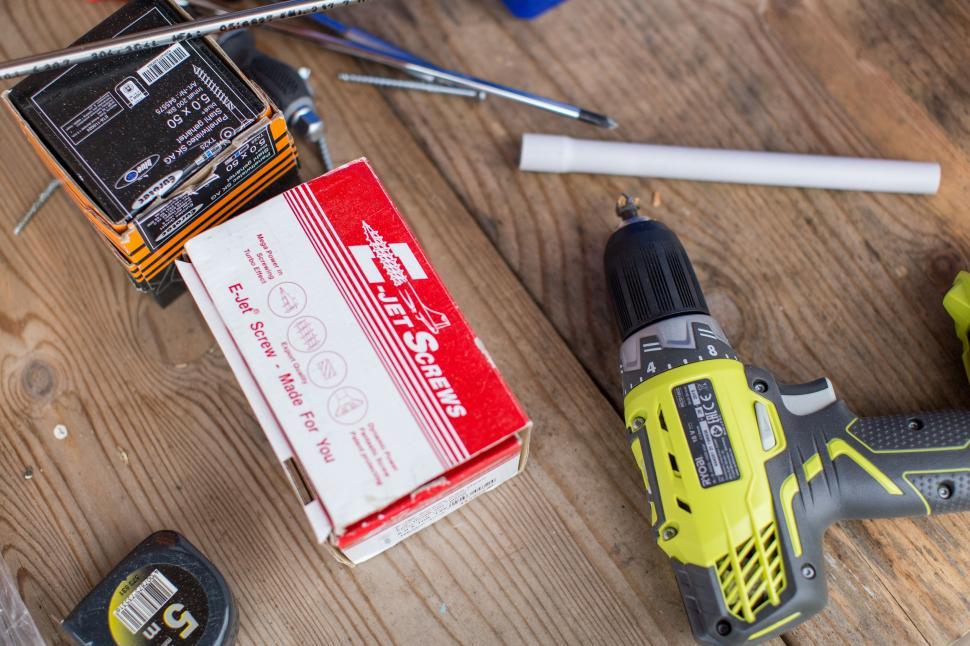 Free Image of Table Covered With Tools and Items 