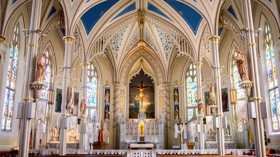 Free Image of Inside View of a Church With Stained Glass Windows 