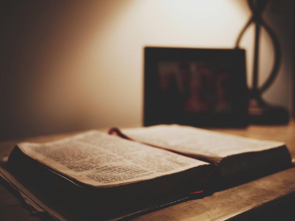 Free Image of Open Book on Wooden Table 