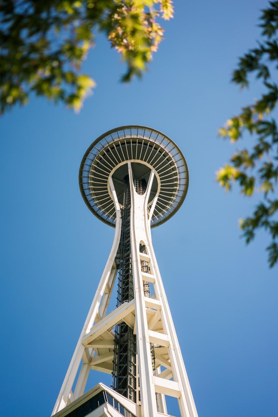 Free Image of Tall White Tower Against Sky 