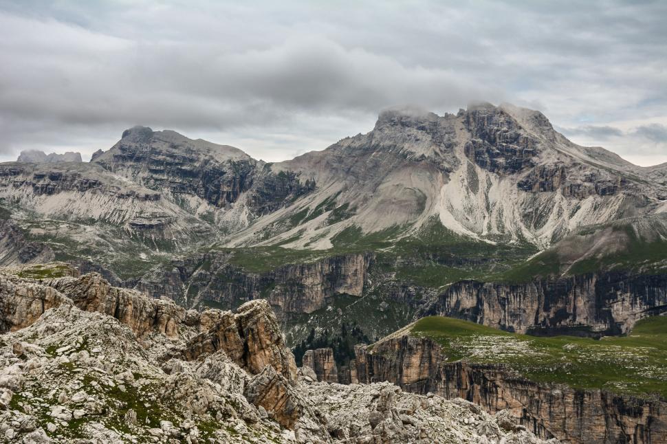 Free Image of Majestic Mountain Range Under Overcast Sky 