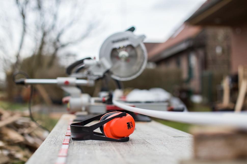 Free Image of Headphones Resting on Wooden Table 