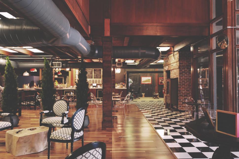 Free Image of Room Filled With Chairs and Tables 