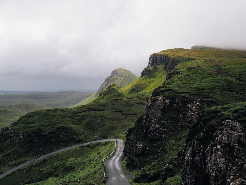 Free Image of Winding Road Cutting Through Mountain Terrain 