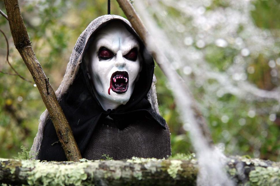 Free Image of Man in Hooded Costume With Mouth Open 