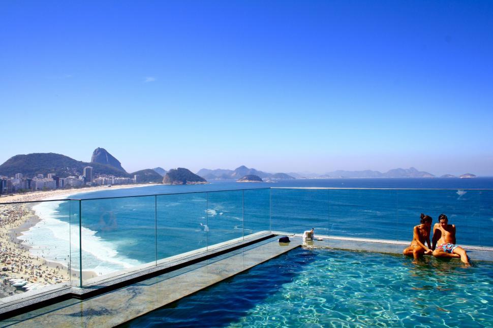 Free Image of Two People Swimming in the Water 