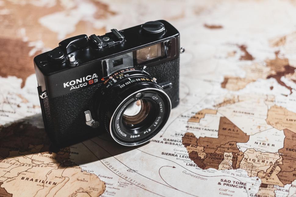 Free Image of Camera on Top of Map 