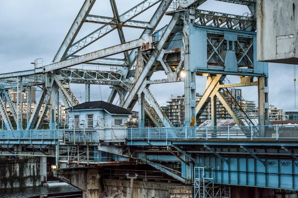 Free Image of Train Crossing Bridge Over River 