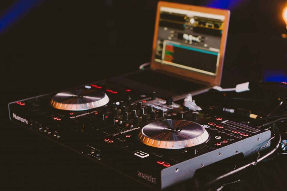 Free Image of Laptop Computer on DJs Deck 