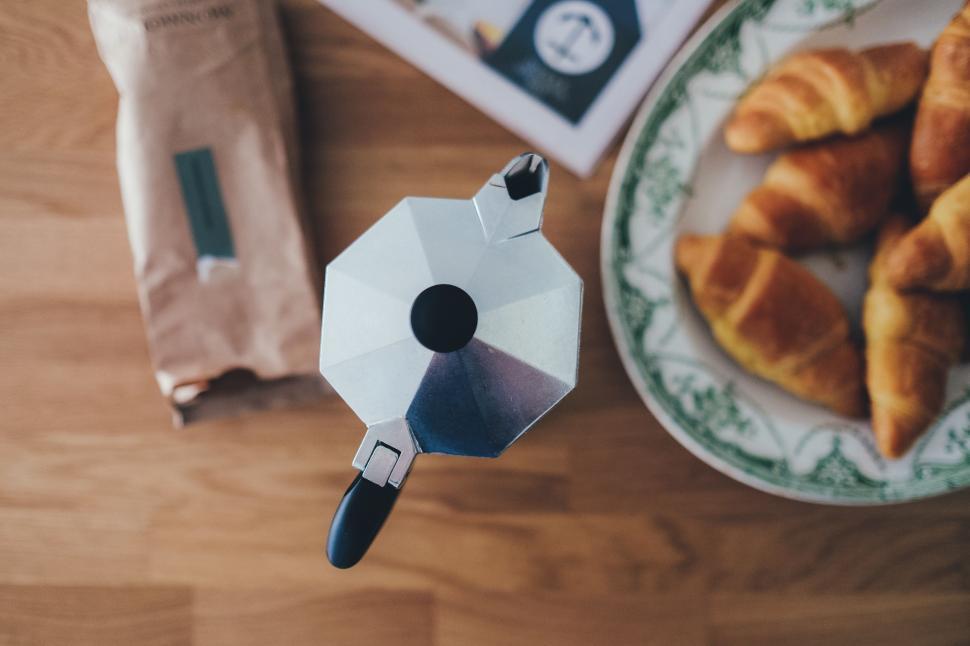 Free Image of Table With Pastries and Plate of Donuts 
