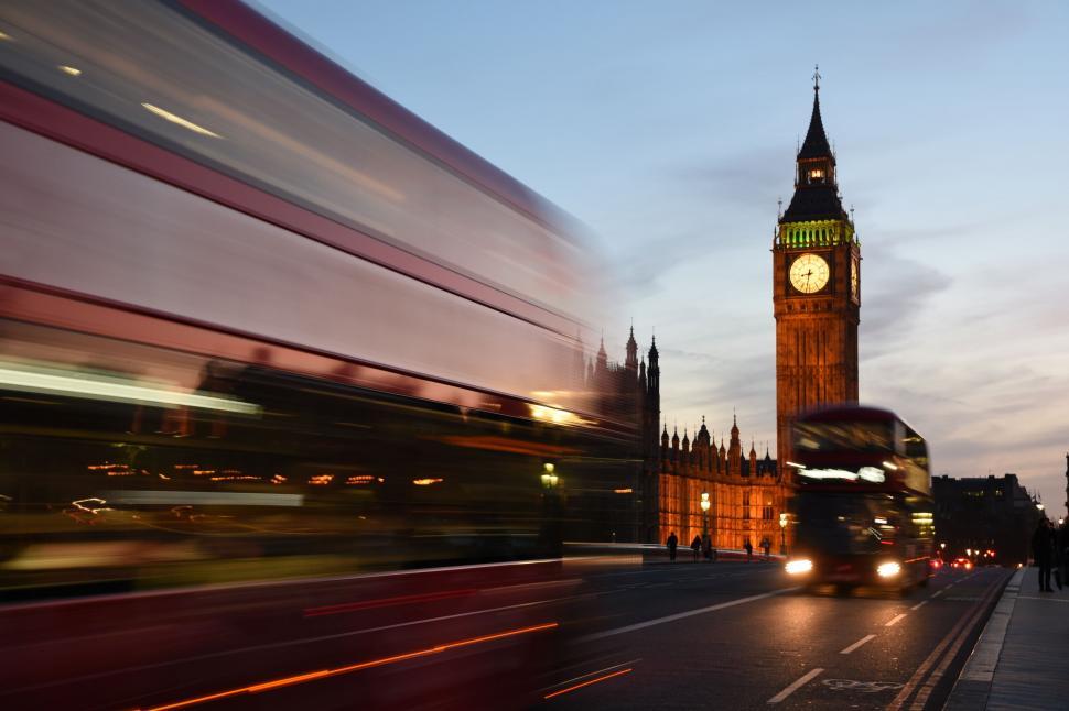 Free Image of The Majesty of a Grand Clock Tower Overlooking a City 