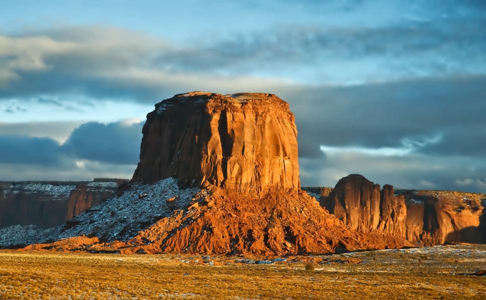 Free Image of Large Rock Formation in Field 