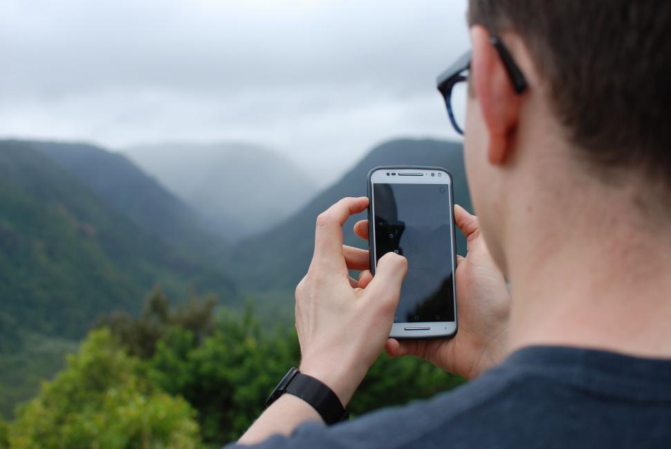 Free Image of Man Taking a Picture With Cell Phone 